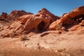 Rock cave and other formations near Elephant Rock during sunny day with blue sky, Valley of Fire State Park, Nevada Royalty Free Stock Photo