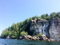 Rock Cliff Face Forested Hill on a Lake