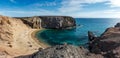 Rock cliffs at Playa del Papagayo Parrot Beach. Lanzarote, Canary Islands, Spain. Royalty Free Stock Photo