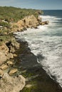 Rock clifs of insonesian seashore near the beach Ngobaran Royalty Free Stock Photo