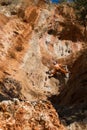 Female rock climber on handholds on challenging route on cliff Royalty Free Stock Photo