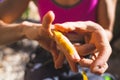 Rock climber bandages his fingers with a protection tape Royalty Free Stock Photo