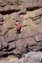 Rock climber with belaying