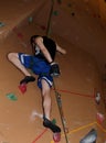 Climber chalk up brown top-rope