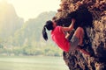 rock climber climbing at seaside mountain rock Royalty Free Stock Photo