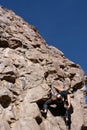 Rock climber in dyno move Royalty Free Stock Photo