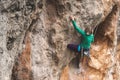 A rock climber on a rock.