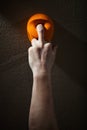 Rock climber gripping handhold with one finger Royalty Free Stock Photo