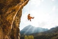 Rock climber hanging on a rope