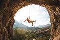 Rock climber hanging on a rope