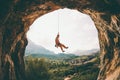 Rock climber hanging on a rope