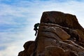 Rock climber making it to the top Royalty Free Stock Photo