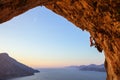 Rock climber on overhanging cliff.