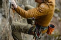 rock climber placing a camming device in a crack Royalty Free Stock Photo