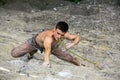 Rock climber preparing to the next move Royalty Free Stock Photo