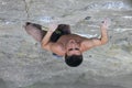 Rock climber preparing to the next move Royalty Free Stock Photo