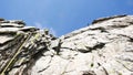 Rock climber rappelling on a climbing route in the Alps of Switzerland Royalty Free Stock Photo