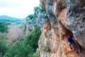 A rock climber on a rock.