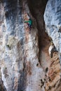 A rock climber on a rock.