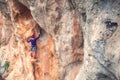 A rock climber on a rock.