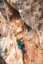 A rock climber on a rock.
