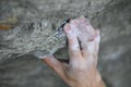Rock climber's hand on handhold Royalty Free Stock Photo