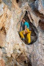 Rock climber on tufas climbing route in Kalymnos, Greece