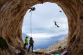 Rock climbers in cave Royalty Free Stock Photo