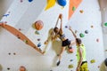 Rock climbers in climbing gym. Royalty Free Stock Photo