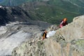 Rock climbers in helmets on rocky mountain route Royalty Free Stock Photo