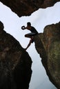 Rock climbing,Man take photo by phone on the rock. Royalty Free Stock Photo