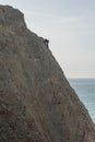 Rock climbing at Point Dume in winter, Malibu, California