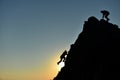 Rock climbing striker and climber climbing without equipment