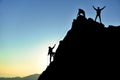 Rock climbing and successful mountaineers Royalty Free Stock Photo
