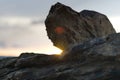 Rocks on a beach at sunset Royalty Free Stock Photo