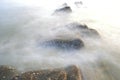 Rock in the coastal waves Royalty Free Stock Photo