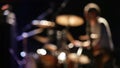 Rock concert: fast drummer movings, unfocused