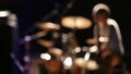 Rock concert fast drummer movings unfocused footage