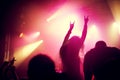 Rock, concert and people dance at night, event or party at music festival with fans in audience at stage. Crowd, energy Royalty Free Stock Photo