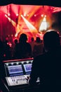 Rock concert, professional sound engineer console at concert