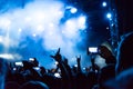 Rock concert, silhouettes of happy people raising up hands Royalty Free Stock Photo