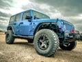 Orange Jeep Rock Crawling Royalty Free Stock Photo