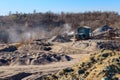 Rock crusher machine, crushing machinery, conveying crushed granite gravel stone in a granite quarry Royalty Free Stock Photo