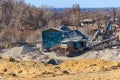 Rock crusher machine, crushing machinery, conveying crushed granite gravel stone in a granite quarry