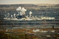 Rock explosion into the quarry for the extraction of granite