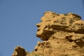 rock face of men in the mountains