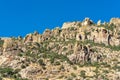 Rock face and stone formation on side of sunlit mountain in late afternoon sun in the great outdoors desert in arizona Royalty Free Stock Photo