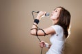 Rock female vocalist on gray background