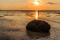 Rock and fisherman silhouette