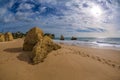 Rock formation on the beach of Tres Irmaos in Alvor, PortimÃÂ£o, Algarve, Portugal, Europe. Praia dos Tres Irmaos.